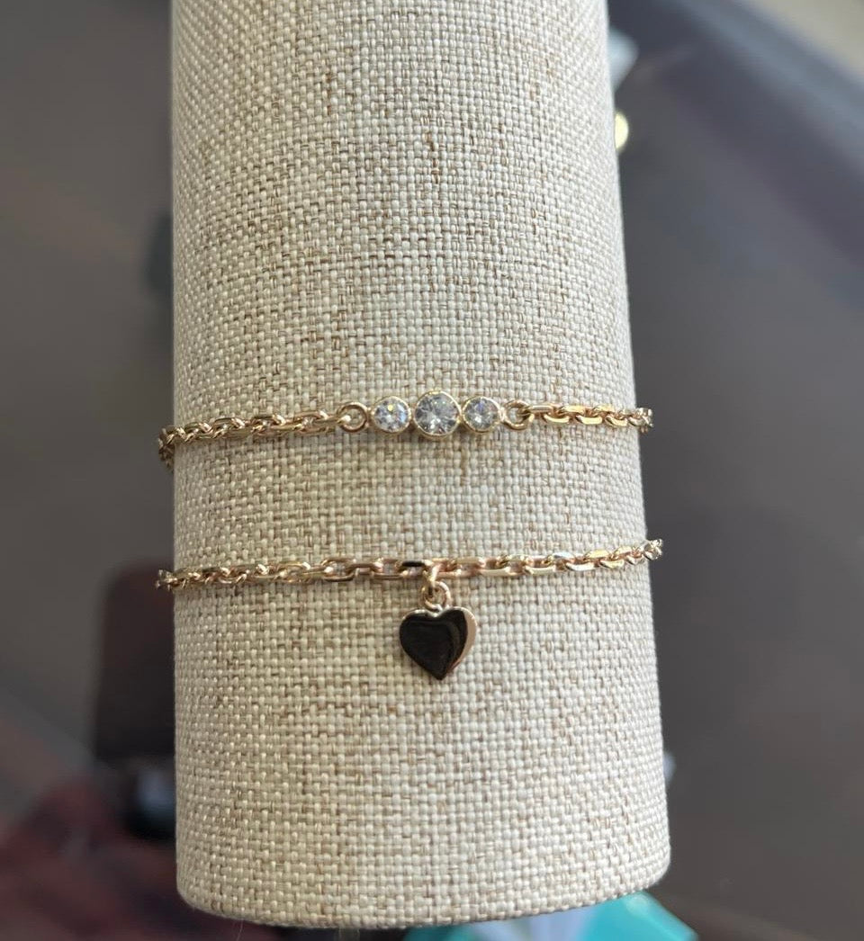 Juego de pulseras finas con zirconias y corazón en oro