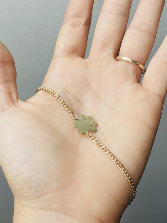 Pulsera con patita en oro