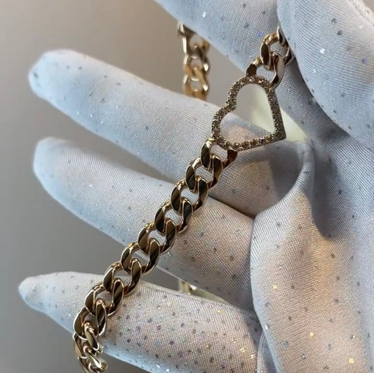 Pulso barbada con corazón contorno de zirconias en oro