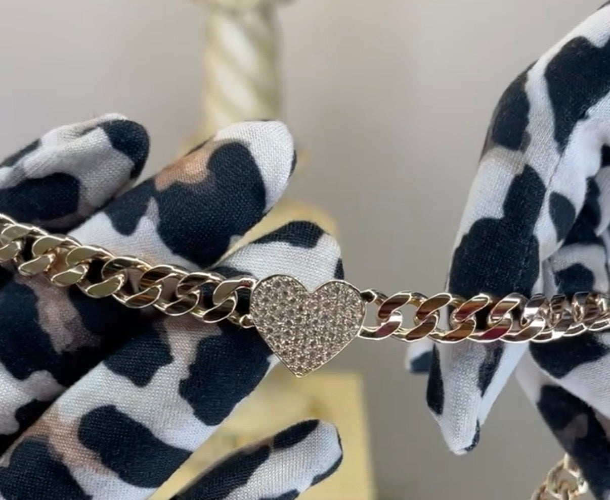 Pulso barbada con corazón de pavé de zirconias en oro