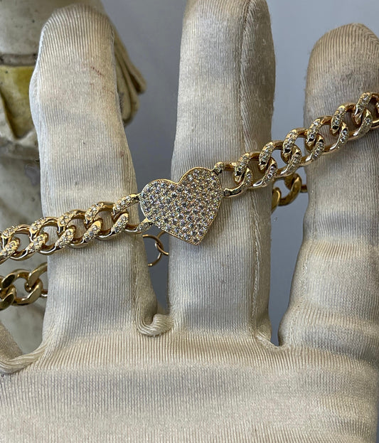 Pulso cubano con corazón pavé de zirconias en oro