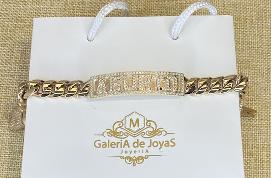 Pulso cubano con placa pavé de zirconias en oro