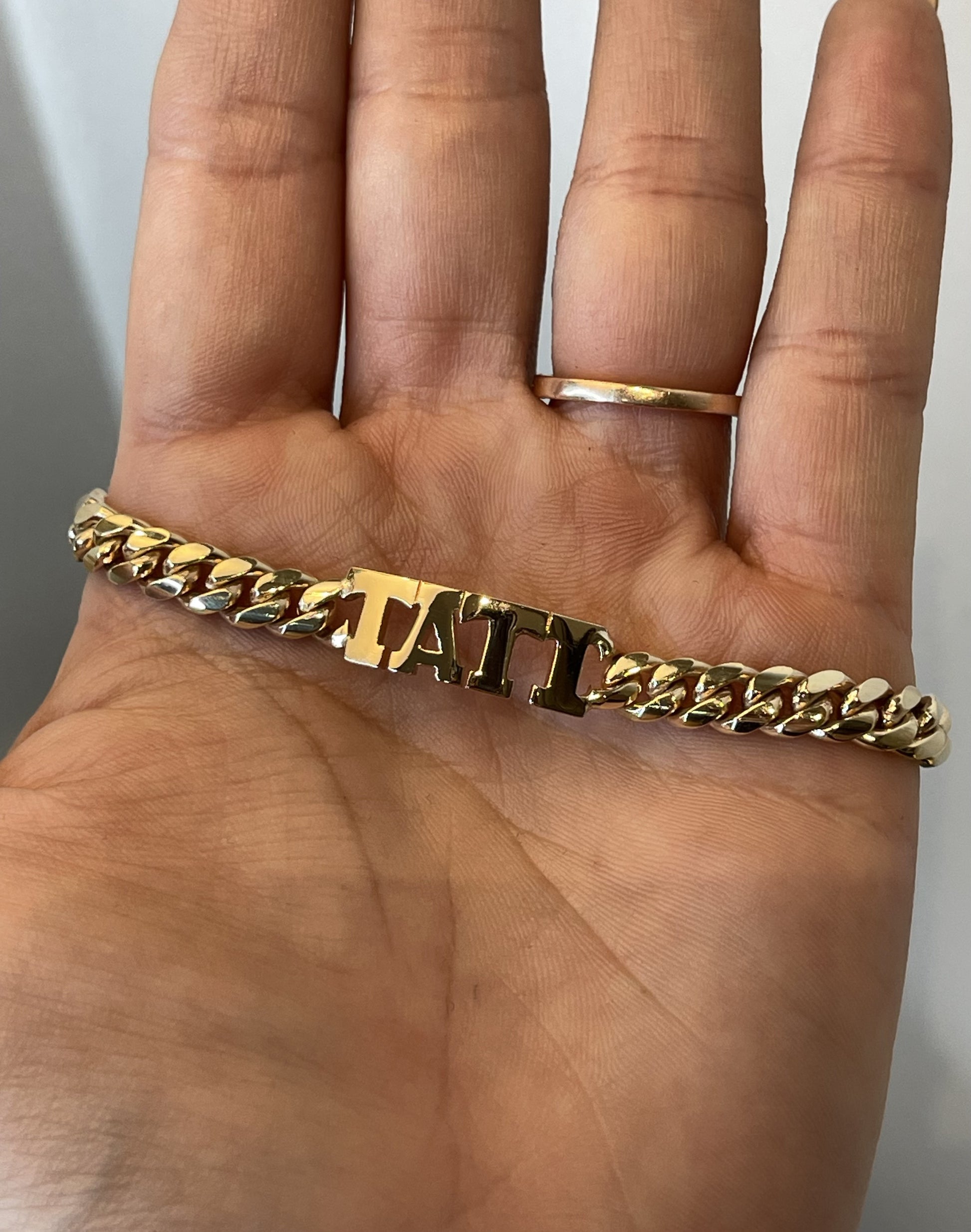 Pulso cubano con nombre Tati en oro