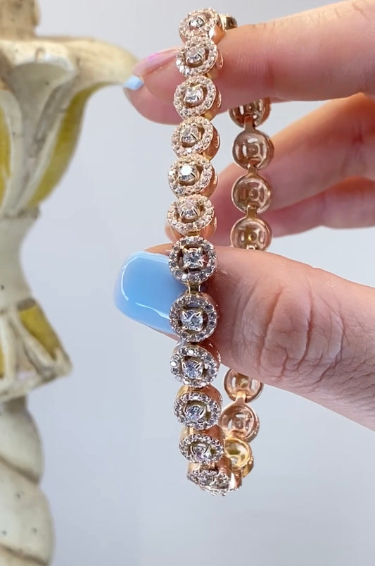 Pulso tennis con halos de zirconias en oro rosado